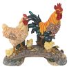 CHICKENS BRIDGING THE ROOST STATUE